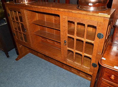 Lot 1182 - An oak dresser top with glazes doors