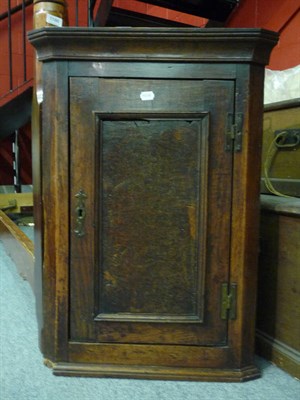 Lot 1184 - 18th century oak corner cabinet