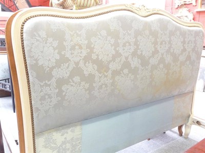 Lot 1188 - Cream bedstead with blue silk fabric