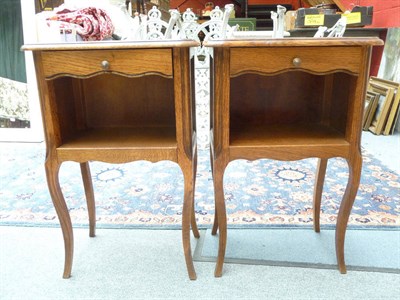 Lot 1203 - Pair of oak bedside cabinets