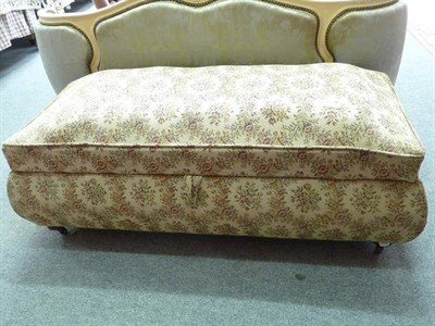 Lot 1205 - An upholstered ottoman