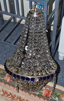 Lot 1211 - An early 20th century basket light fitting with clear and blue drops