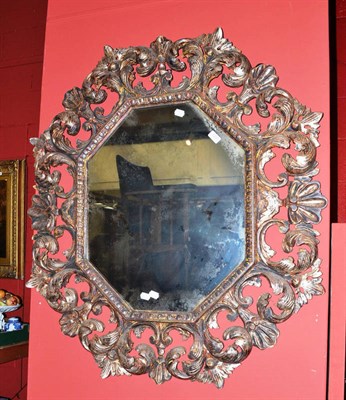 Lot 1220 - A gilt hexagonal and acanthus decorated wall mirror