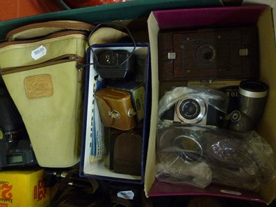 Lot 1244 - A box of six cameras including Voigtlander Yashika SLR with two lenses and flash etc