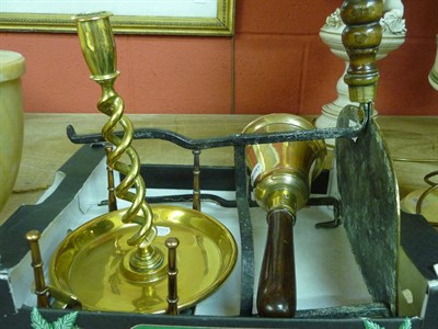 Lot 1251 - Four items of brassware including 19th century trivet, pierced footman, twist candlestick and...