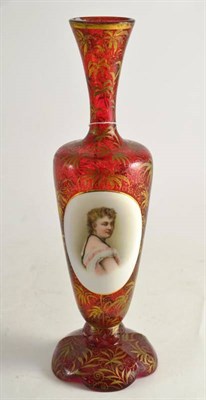 Lot 38 - A Bohemian overlaid glass vase decorated with a printed portrait of a lady, 34cm
