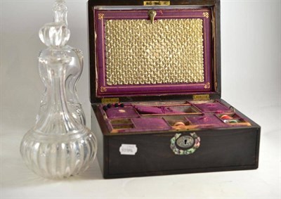 Lot 45 - A coromandel sewing box and two decanters