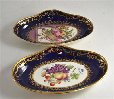 Lot 49 - A pair of oval porcelain dishes painted with garlands of flowers and fruit