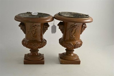 Lot 77 - A pair of stoneware campana urns with classical decoration and zinc liners