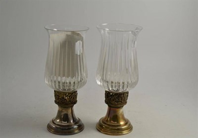 Lot 78 - Pair of silver commemorative candle lamps (1984 Great Fire)