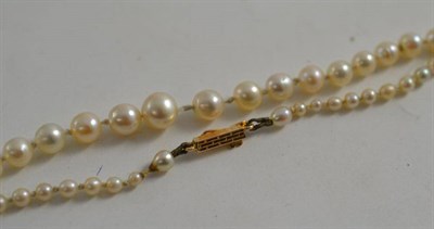 Lot 97 - A strand of graduated pearls
