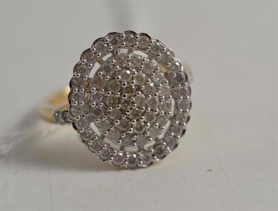 Lot 102 - A 9ct gold oval diamond cluster ring