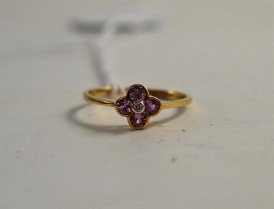 Lot 113 - A 9ct gold pink sapphire and diamond cluster ring