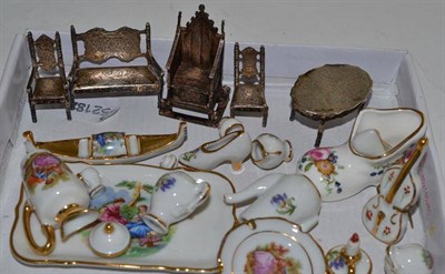 Lot 125 - Assorted silver and porcelain doll's house furniture
