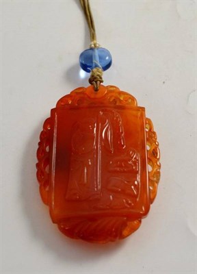 Lot 133 - A Chinese carved carnelian pendant, circa 1900