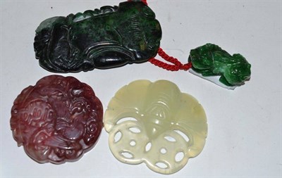 Lot 139 - Four assorted Chinese hard/soft stone pendants
