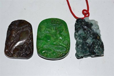 Lot 140 - Three Chinese jade/jadeite type carved and pierced pendants