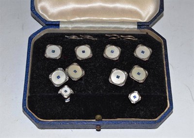 Lot 146 - A cased set of 9ct white gold and sapphire set cufflinks