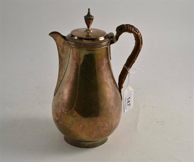Lot 147 - A hot water jug of plain baluster form, London 1791, 23cm