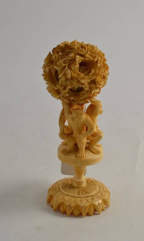 Lot 152 - An ivory puzzle ball on stand