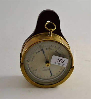 Lot 162 - An aneroid barometer signed 'Potter Poultry, London'