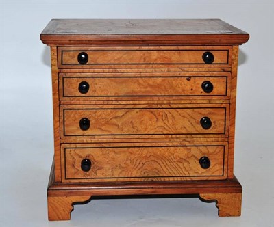 Lot 174 - Miniature four drawer chest
