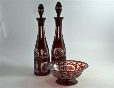 Lot 182 - A pair of ruby flashed spirit flasks/decanters and a ruby flashed bowl