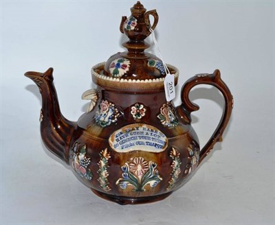 Lot 201 - A Measham bargeware large teapot and cover, dated 1889