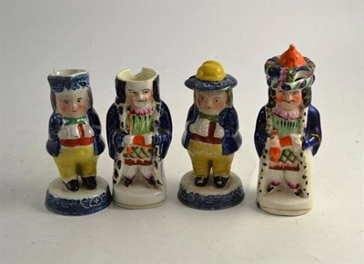 Lot 214 - Two 19th century Staffordshire willow pattern Toby condiment and two others