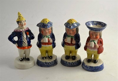 Lot 215 - Two 19th century Staffordshire blue and white Toby pepperettes, a Toby salt and a rare...