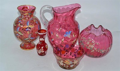 Lot 239 - A large cranberry enamelled glass jug, cranberry enamelled bowl, cranberry ovoid vase, small...