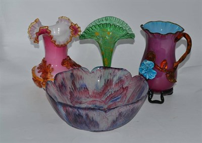 Lot 241 - Large purple glass fruit bowl, two green enamelled glass vases, pink vase and a purple jug...