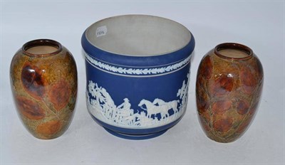 Lot 242 - Pair of Royal Doulton leaf vases and an Adams blue and white planter with hunting scene (3)