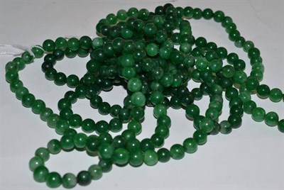 Lot 261 - Two Chinese jade/jadeite long string necklaces