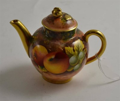 Lot 270 - Royal Worcester fruit painted small teapot