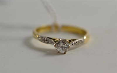 Lot 276 - A diamond solitaire ring with diamond-set shoulders