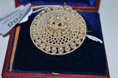 Lot 288 - A mid-19th century seed pearl brooch in a fitted case by Lambert of London