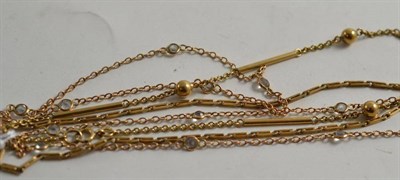 Lot 297 - Two 9ct gold chains and a spectacle set chain