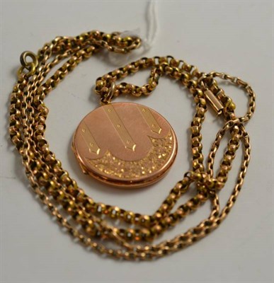 Lot 304 - A fancy link chain with applied plaque '9ct' and a 9ct gold engraved locket on belcher chain