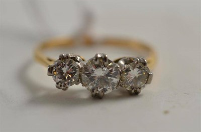 Lot 307 - A diamond three stone ring