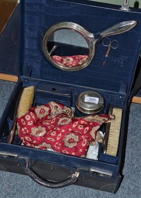 Lot 320 - A Dutch white metal mounted travelling vanity set, with family monogram engraved on each piece...