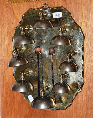 Lot 325 - A brass wall mounted butler's bell with beaters