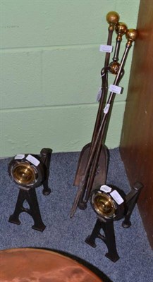 Lot 326 - Set of three steel and brass fire irons and dogs