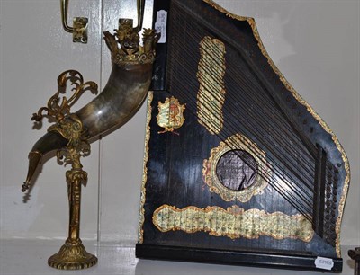 Lot 338 - Table horn with brass mounts and an ebonised zither