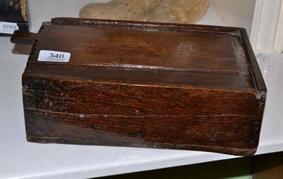 Lot 340 - An early 19th century oak box with sliding lid