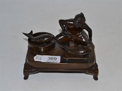 Lot 369 - A bronze Japanese inkwell depicting a crouching figure and two fish