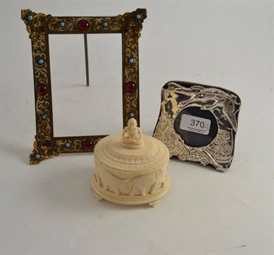 Lot 370 - A brass photo frame set with decorative stones, a silver photo frame and an early 20th century...