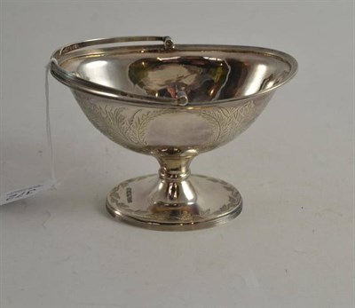 Lot 372 - A silver sugar basin with handle