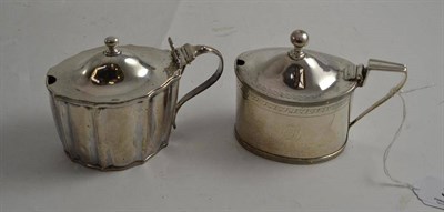 Lot 375 - Two George III silver mustard pots