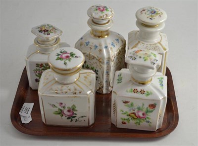 Lot 387 - Five 19th century Continental floral decorated scent bottles and stoppers